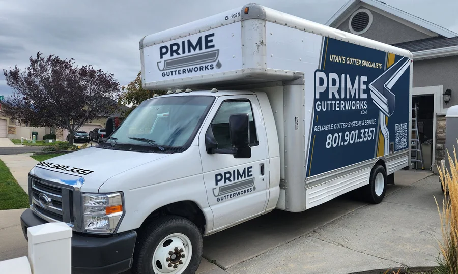 Front and side view of a Prime Gutterworks service truck